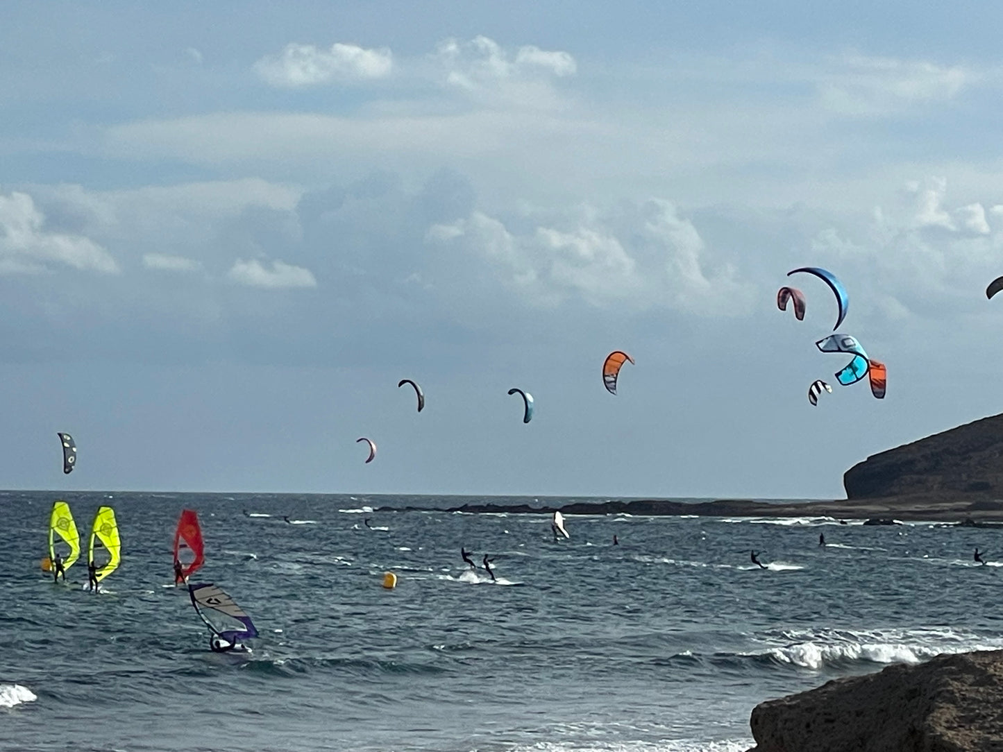 Wing foiling lessons Kite Surfing Lessons to end foiling lessons with surf to summit El Medano South Tenerife