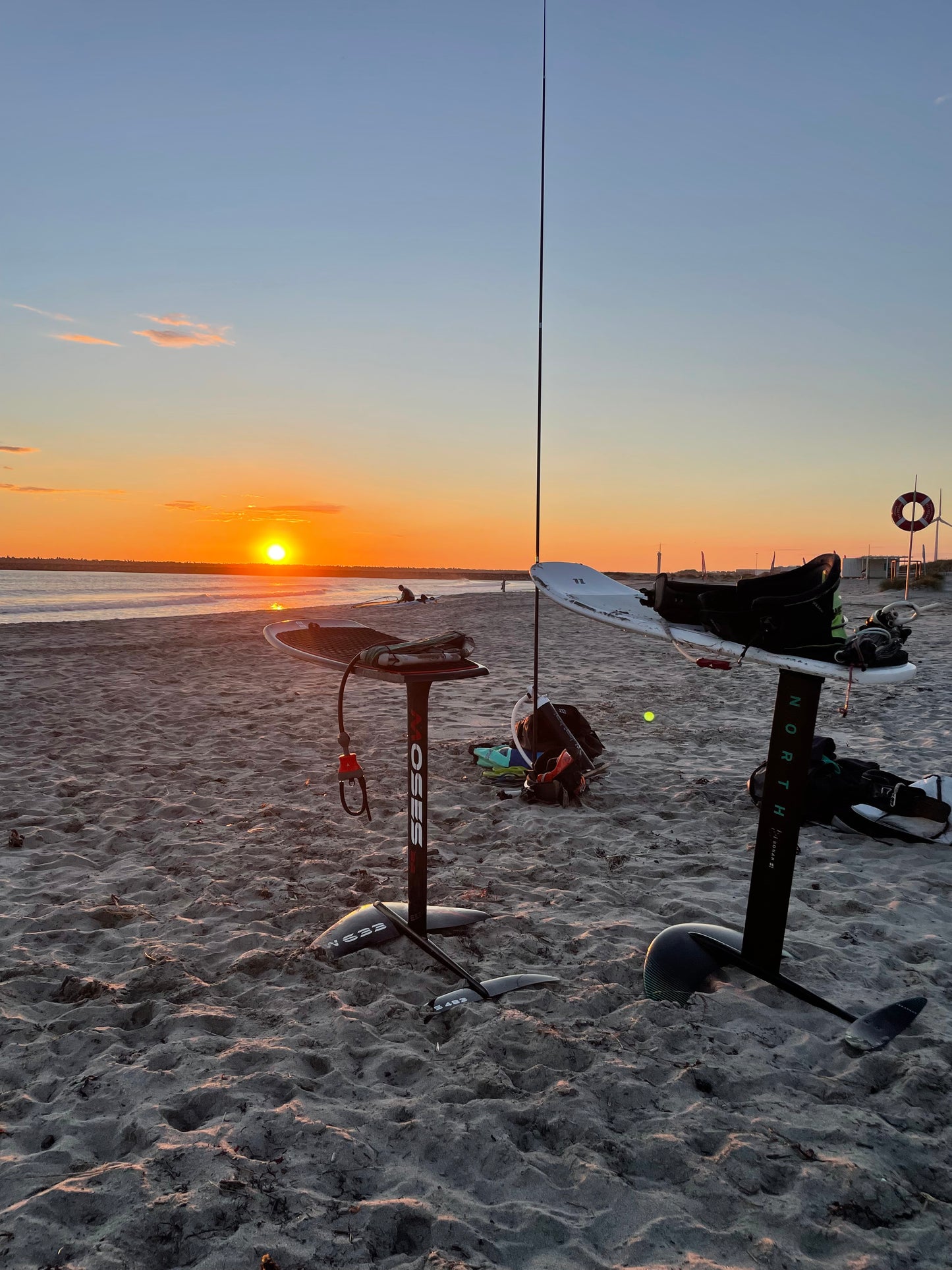 Sunset beach with hydrofoils with surf to Summit