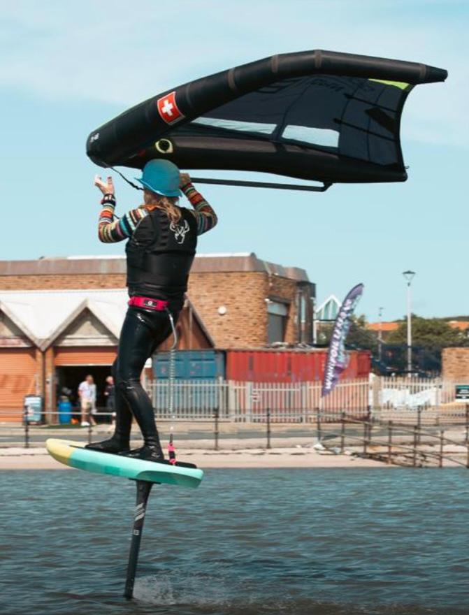 Surf Summit student learning how to tack