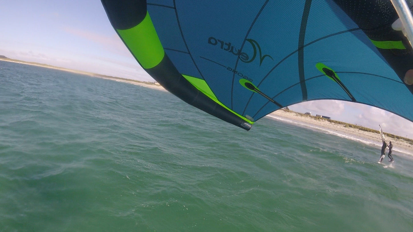 Wing foiling lessons Kite Surfing Lessons to end foiling lessons with surf to summit El Medano South Tenerife