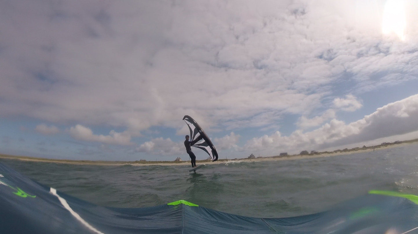 Wing foiling lessons Kite Surfing Lessons to end foiling lessons with surf to summit El Medano South Tenerife