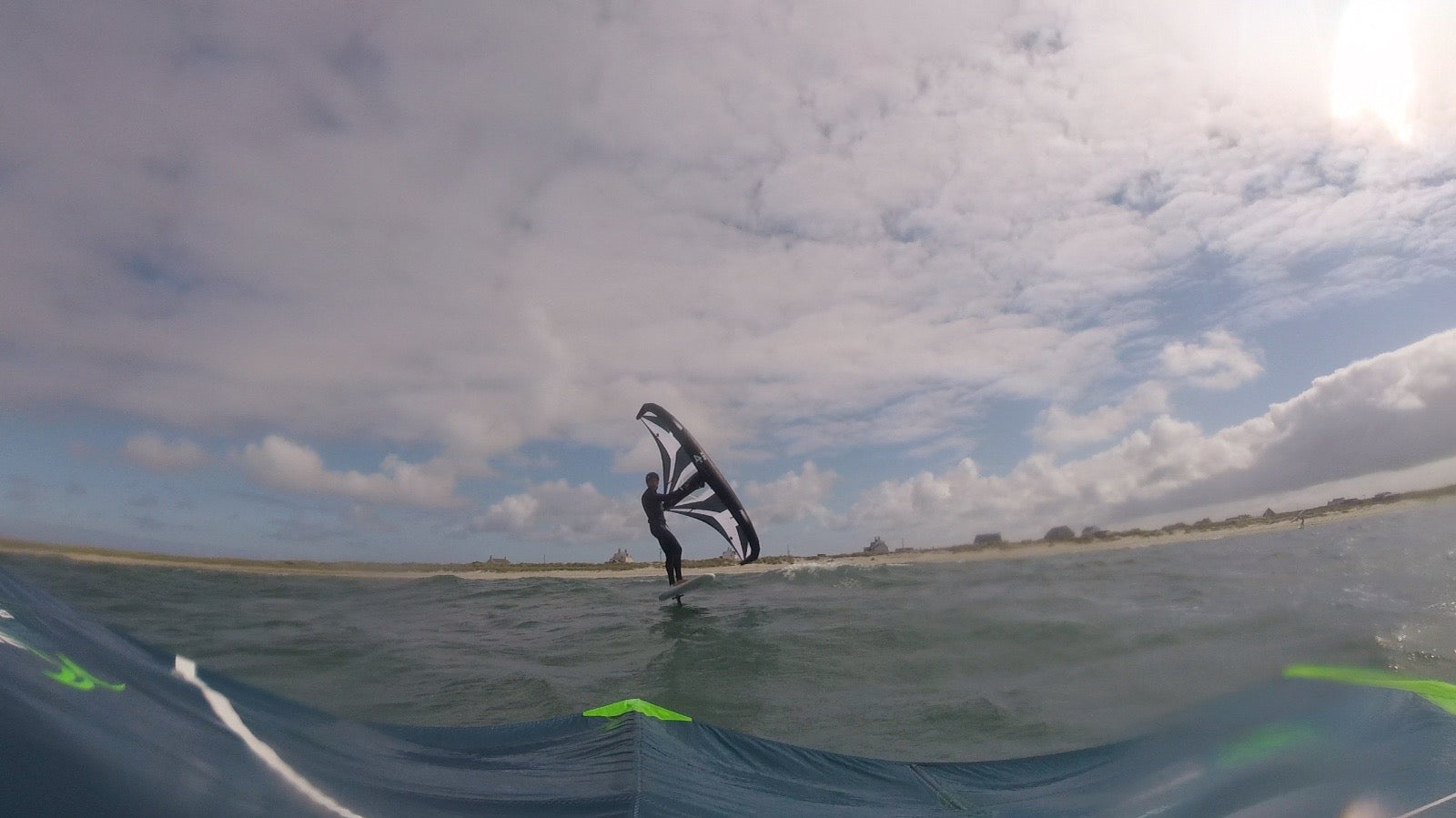 Wing foiling lessons Kite Surfing Lessons to end foiling lessons with surf to summit El Medano South Tenerife