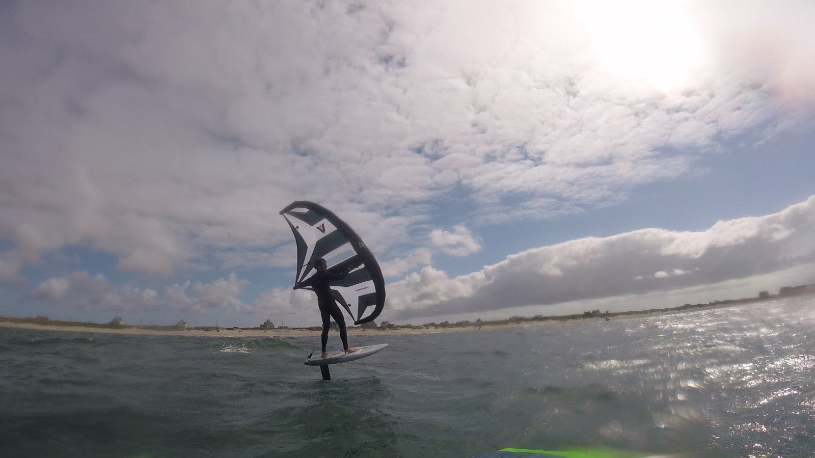 Wing foiling lessons Kite Surfing Lessons to end foiling lessons with surf to summit El Medano South Tenerife