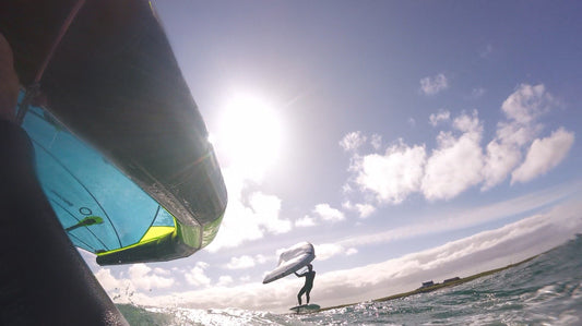 Wing foiling lessons Kite Surfing Lessons to end foiling lessons with surf to summit